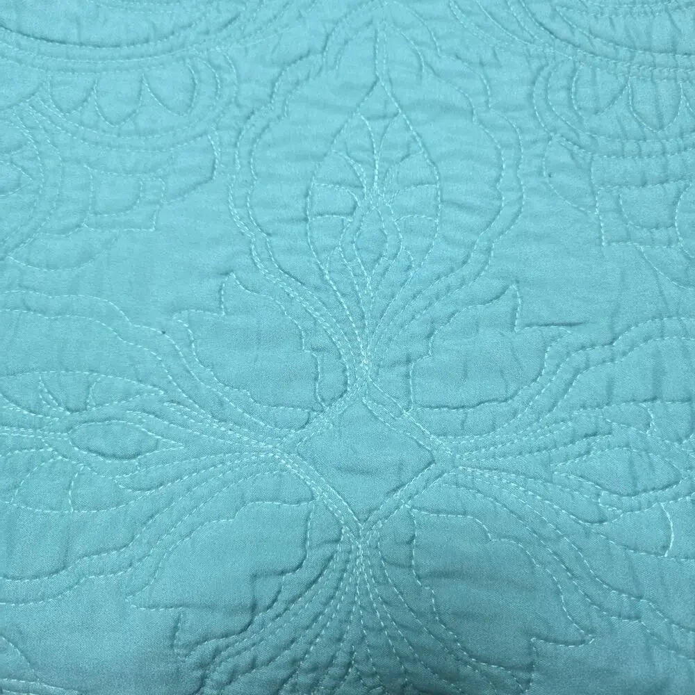 American Pacific teal quilted